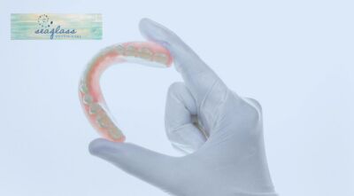 High-quality dentures designed to restore a strong, confident smile at Seaglass Dental Care in North Palm Beach